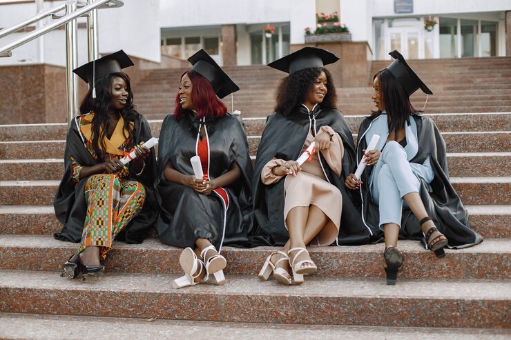 https://cornerstone-uts.org/wp-content/uploads/2023/10/group-young-afro-american-female-students-dressed-black-graduation-gown-campus-as-background_1157-50420.jpg